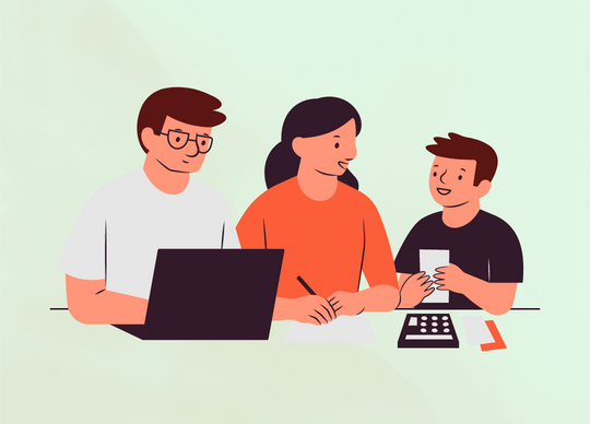 This image shows how financial literacy and an open conversation is beneficial for a family. The father is on the laptop and the mother and the teen son are going over the numbers, perhaps discussing budgeting.